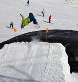 A boarder gets air before safely landing in the AirBag at The Remarkables